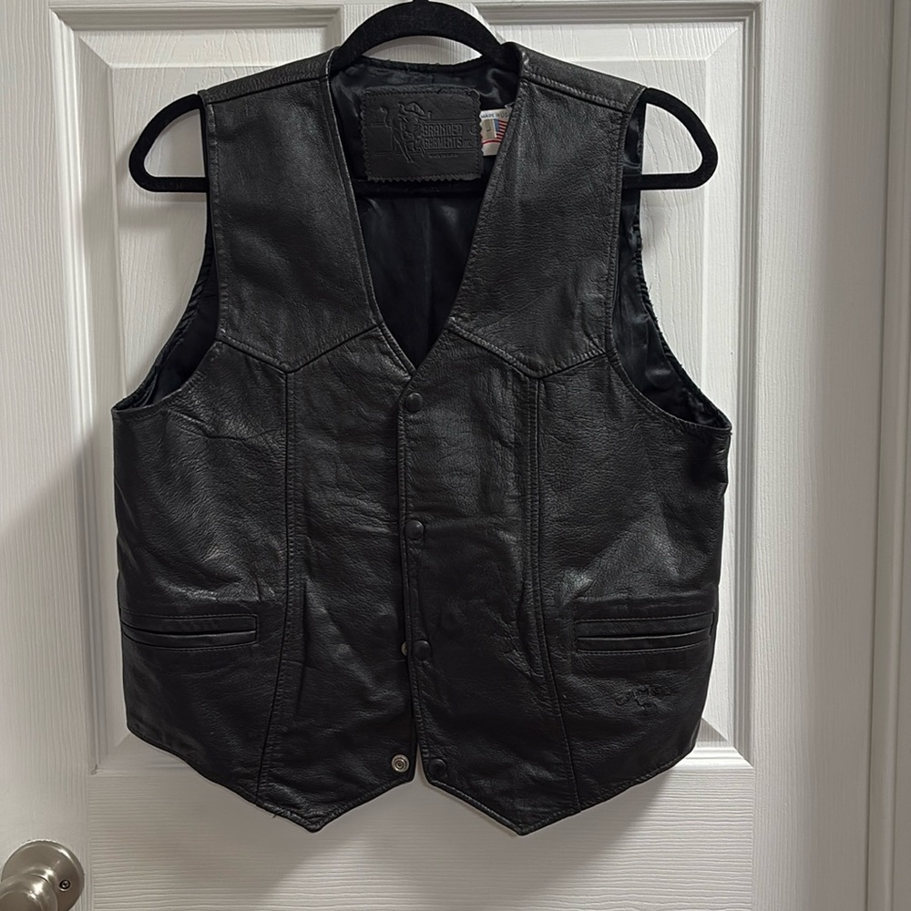 Black leather vest, size, large men’s, very good shape